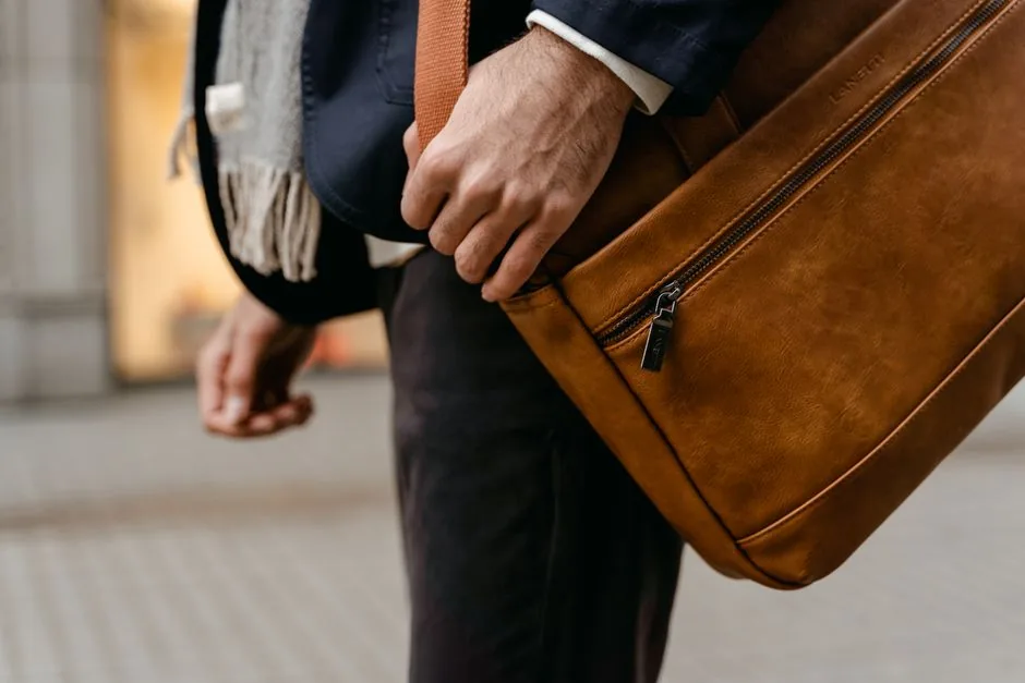 Carry on essentials packed neatly inside an open travel bag